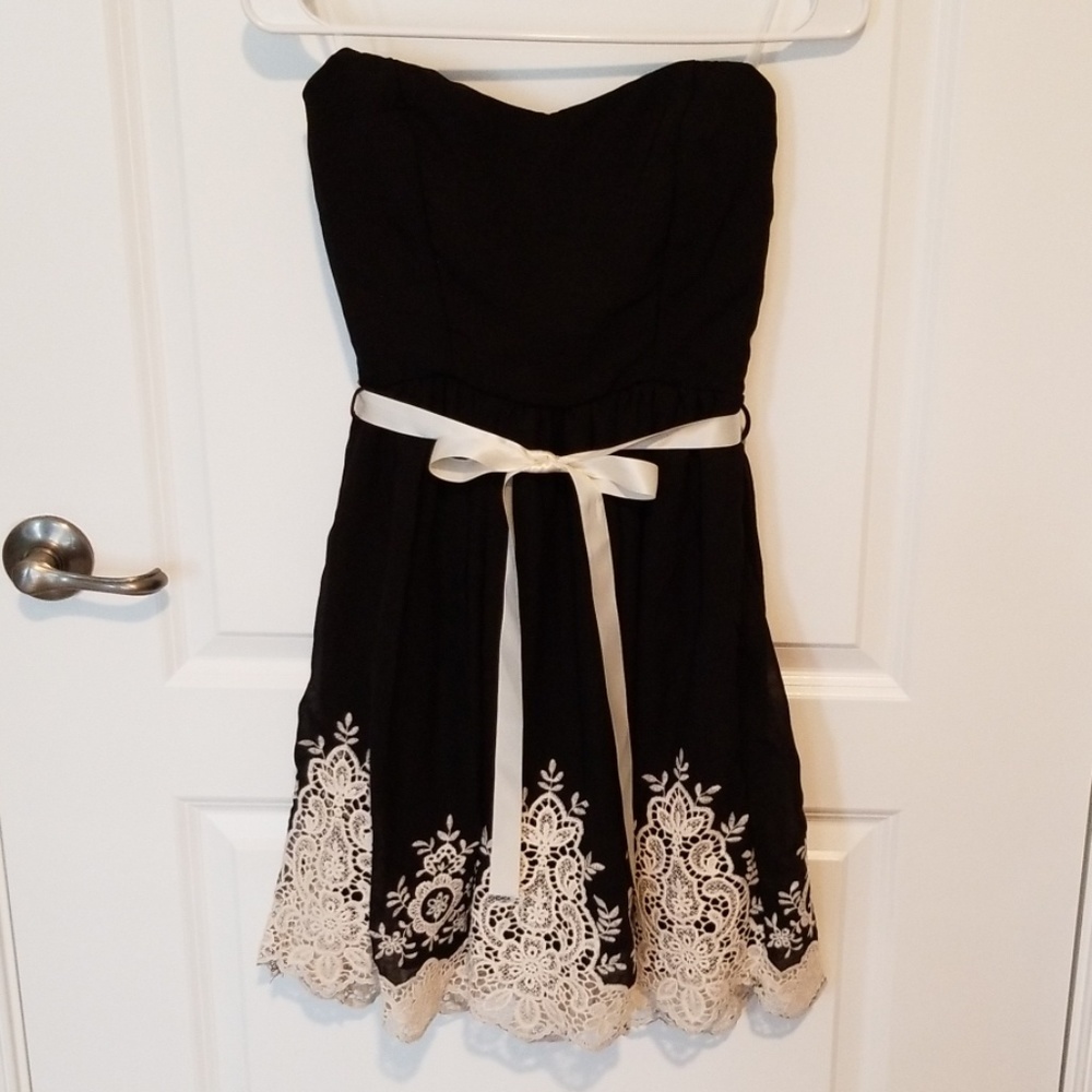 Mystic strapless black dress.